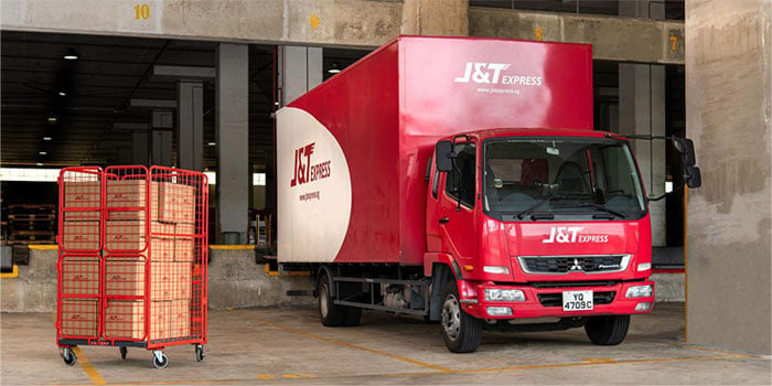 J&T-truck-and-parcels-at-the-warehouse.